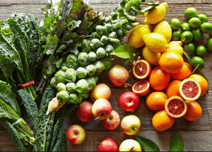 a group of fruits and vegetables on a wood surface Healthy Weight Loss Diets Burnley